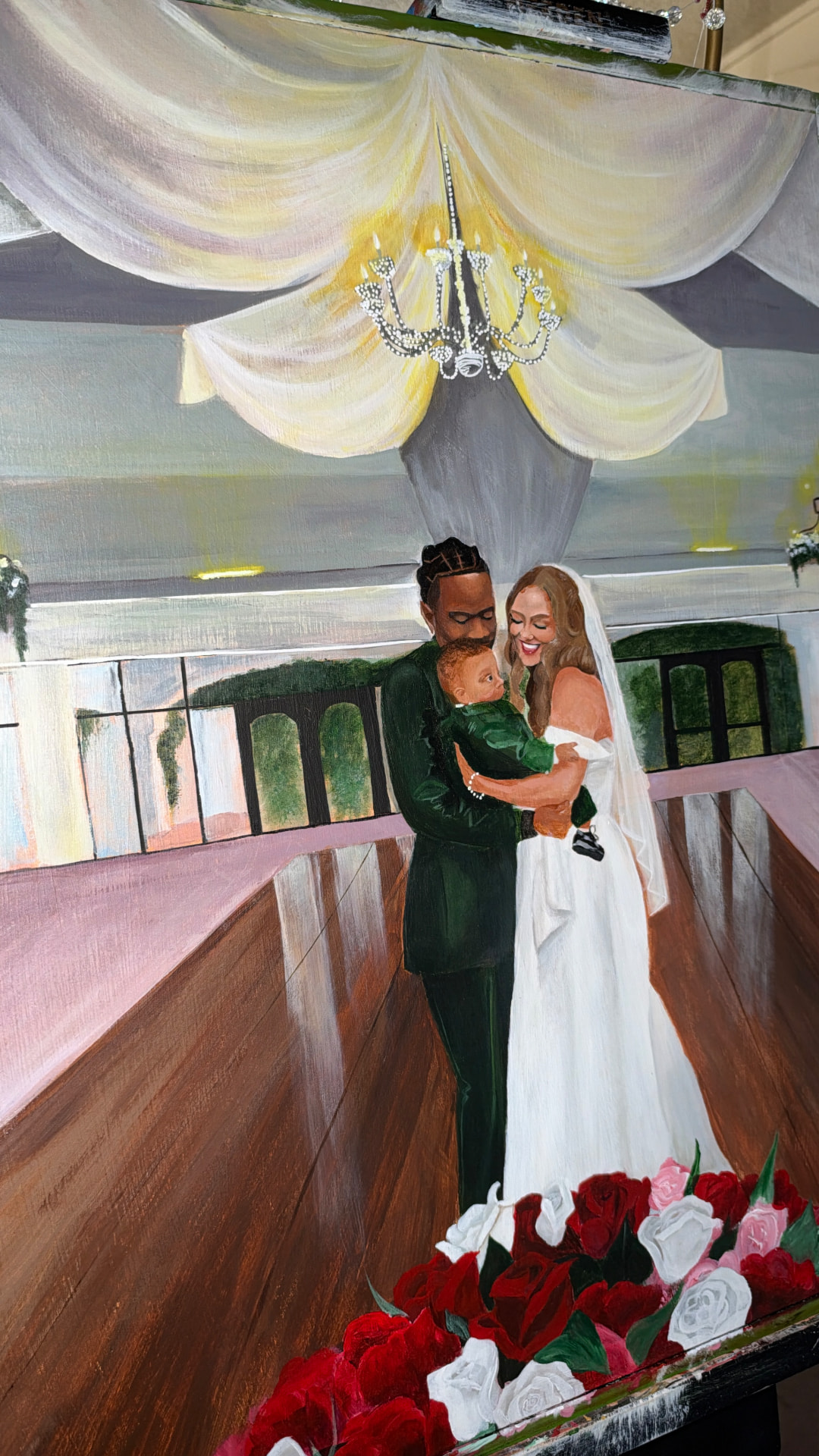 The wedding reception painting in the studio, refined with more detail in the couple, the drapery, and the chandelier light